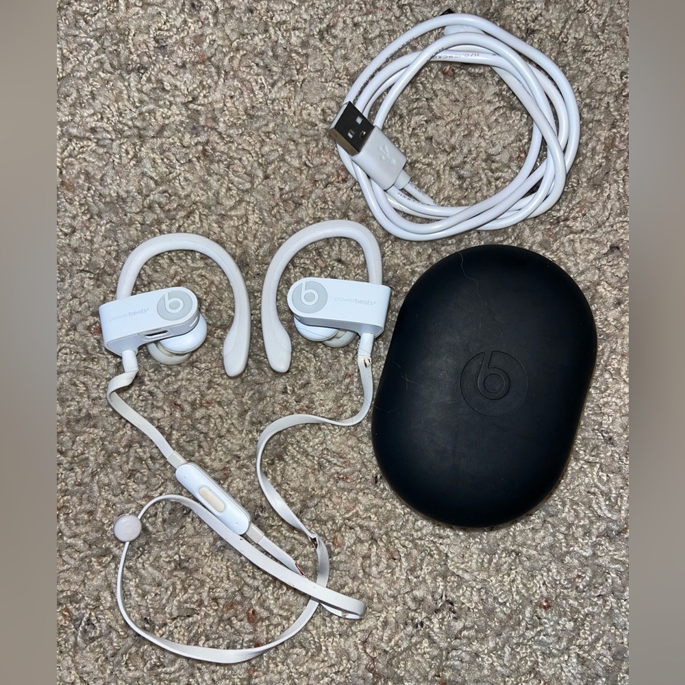Beats by Dr. Dre Powerbeats earbuds in white
